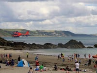 Two airlifts from busy beach