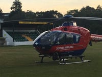 Football match delayed by air ambulance landing on pitch