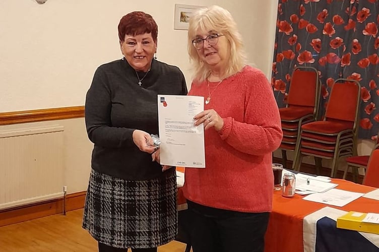 Gwen Stevens being awarded