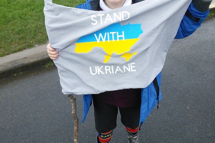 Children at Saltash primary take part in a sponsored walk for Ukraine 