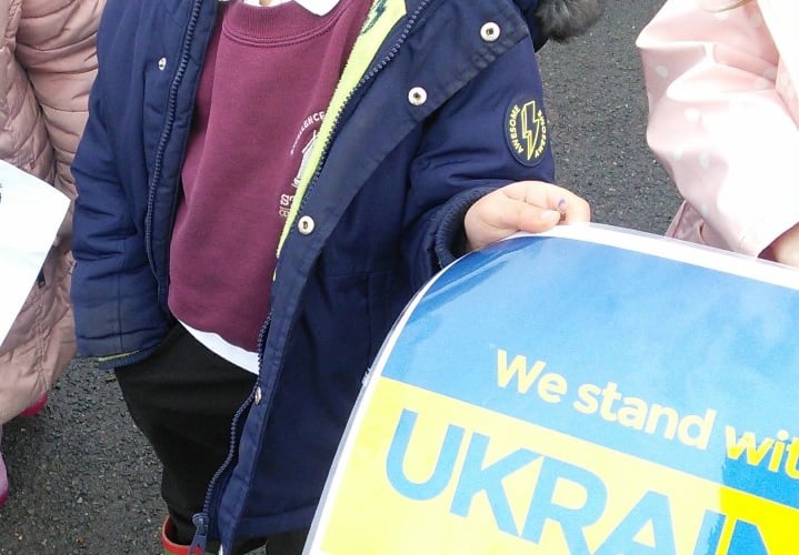 Children at Saltash primary take part in a sponsored walk for Ukraine 