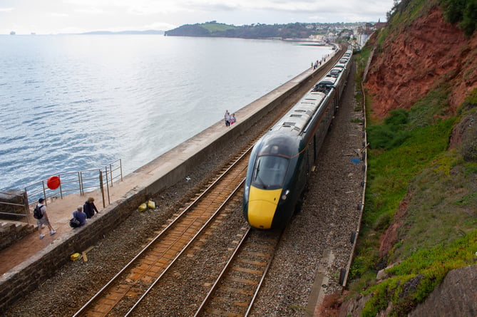 A Great Western Railway InterCity Express high speed train on the sea wall stretch of mainline between Dawlish and Teignmouth in Devon.