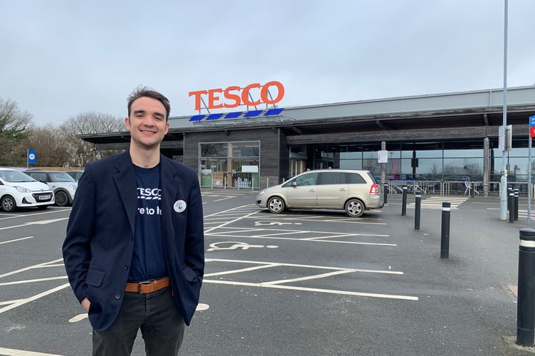 New community champion Will Turner outside the Callington Tesco store