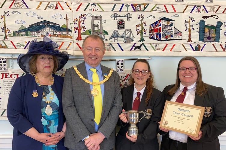 The presentation to the band of the Best Performance Cup with the Mayor of Saltash Councillor Pete Samuels and the Mayoress Councillor Brenda Samuels with Gretchen Melley (right) and Mandy Winn (left) representatives of the band collecting the award.