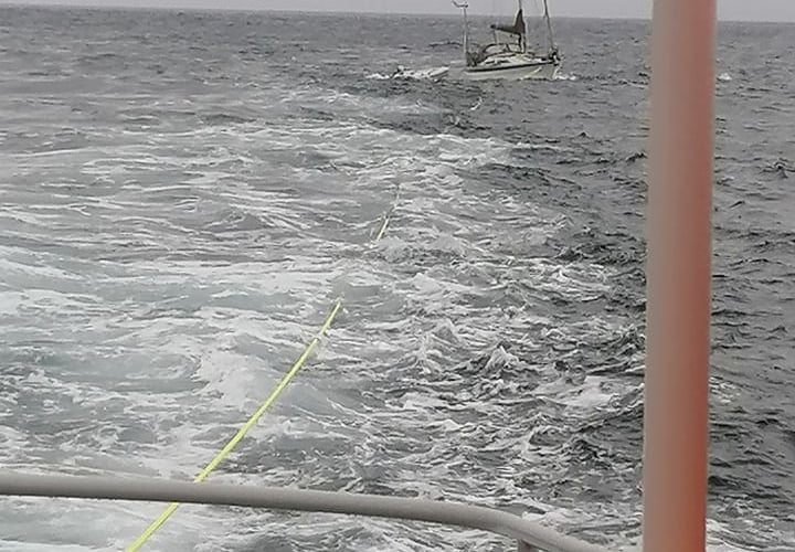 Delia and Chris towed by Sennen Cove lifeboat crew