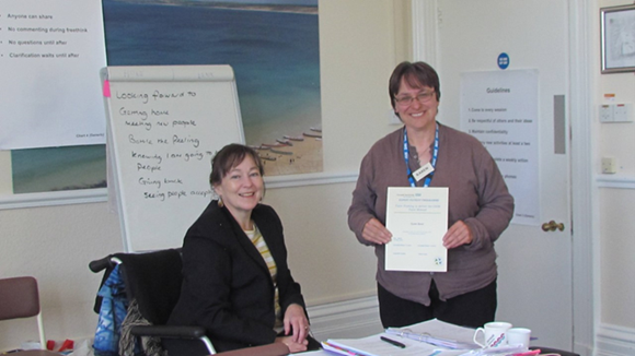 Could this be you? Karen receives her certificate following successful completion of the EPP tutor training course.