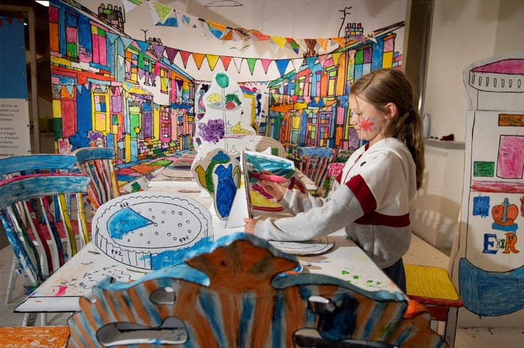 Colouring in a street party scene