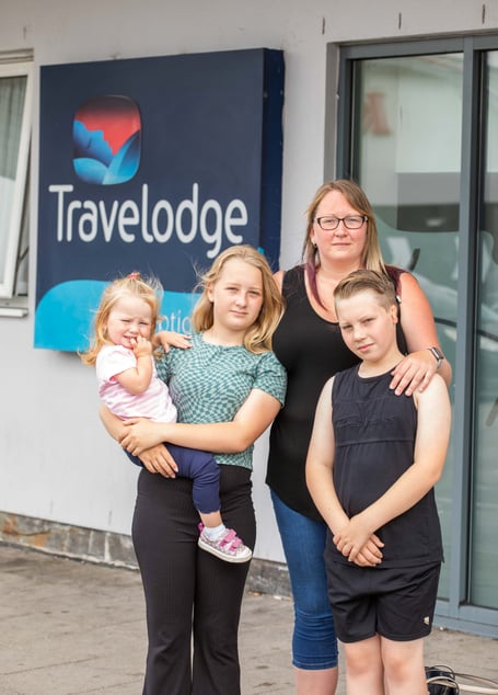 Charlene Pascoe with her children 12-year-old Freya, 10-year-old Kieran and one-year-old Darcy, outside the Travelodge in St Austell, Cornwall. 31st July 2022 . See SWNS story SWLNhotel. A struggling family evicted from their house in Britain's second home capital have been living in a Travelodge for four months - as a council struggle to rehome them. Charlene Pascoe, 34, and her three kids were left with nowhere to go after being evicted from their rental property earlier this year.They have been staying in a hotel room in St Austell in Cornwall for 15 weeks with no idea when they'll be able to leave.Charlene, Freya, 12, Kieran, ten, and Darcy, two, have had to rely on their family and friends who live nearby for meals and play time away from their Travelodge room.
