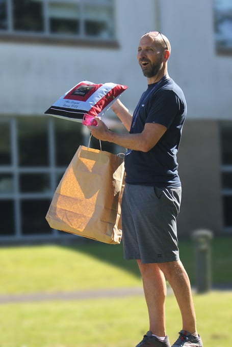 ALEX Lingard head of Liskeard School and Community College with one of his leaving gifts