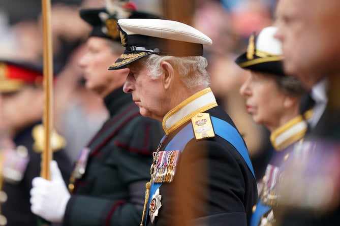 King Charles III, in the Ceremonial Procession following her State Funeral at Westminster Abbey, London. Picture date: Monday September 19, 2022.