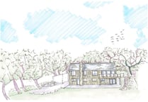 Family gets permission for new home despite dividing opinion