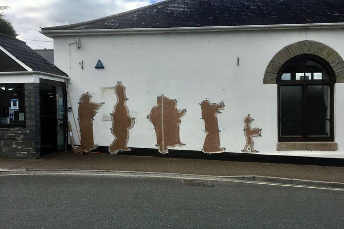 The murals in Callington created by Fierek Studio Pottery are being prepared 