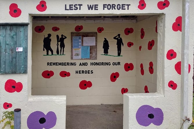 Gill Bower and Sam Rayner have been painting the bus stop in St Dominick for a few years for  Remembrance on behalf St Dominick Parish Council