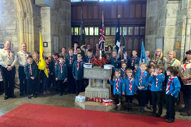 The 1st Linkinhorne Scout Group with their Leaders on Sunday, November 13 at St. Melor's church, Linkinhorne after the service on the 13th November 