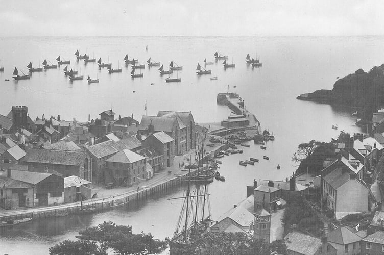 Old fishing luggers at anchor in Looe Bay in an undated image from the 1930s