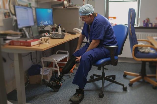 Surgeon charged with fraud after his legs were amputated