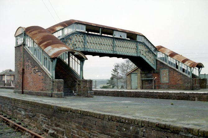The rusting, vandalised remains of the historic footbridge at Okehampton station in 1982. 