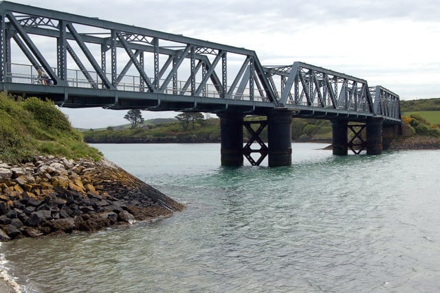 Some disused railways have seen a second life as cycle trails. Here at Little Petherick, just outside Padstow, a iron bridge now carries cyclists rather than trains on the Camel Trail, after laying abandoned from its closure in 1967 until the 1990s.