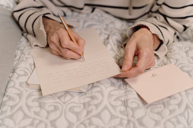 woman writing letter