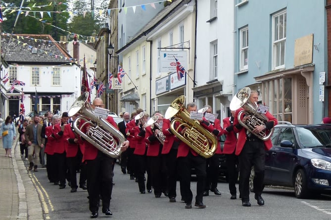 The town band leading the coronation parade in Lostwithiel