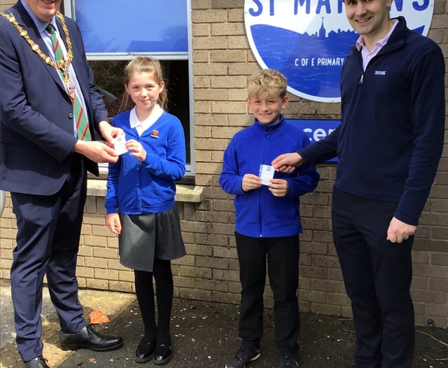 Pupils presented with coronation badges