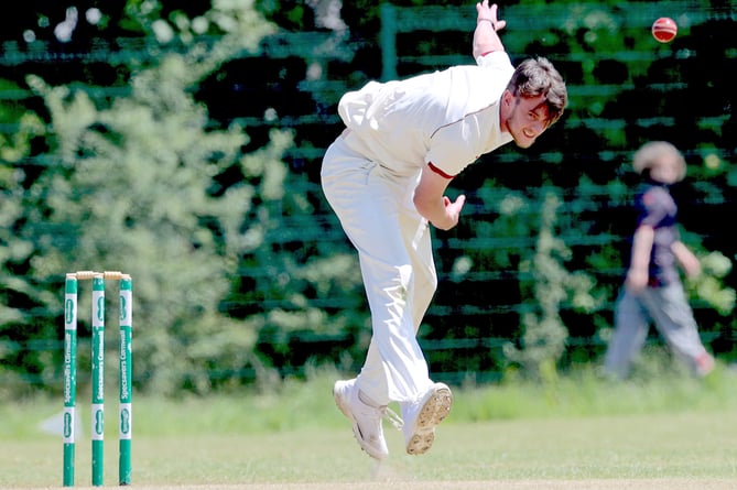 Liskeard's JJ Webber on his way to taking 8-47 against Lanhydrock Seconds at Lux Park on Saturday.