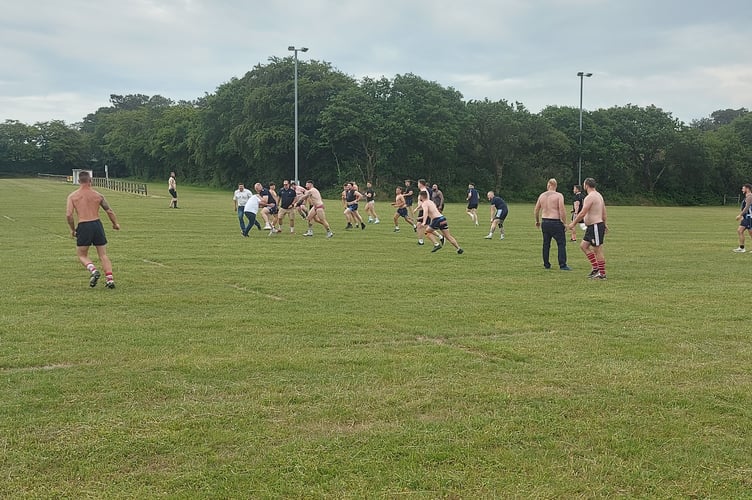 Rugby on the pitch at the celebration of the life of Mike Allen