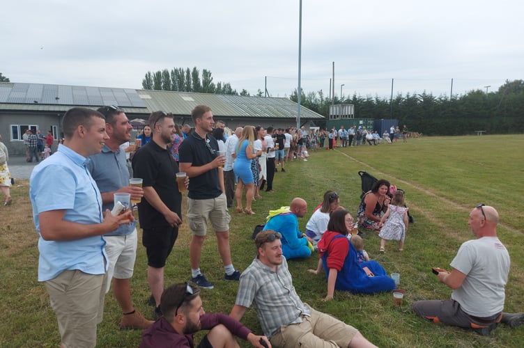 A large crowd of friends and family of Mike Allen celebrate his life