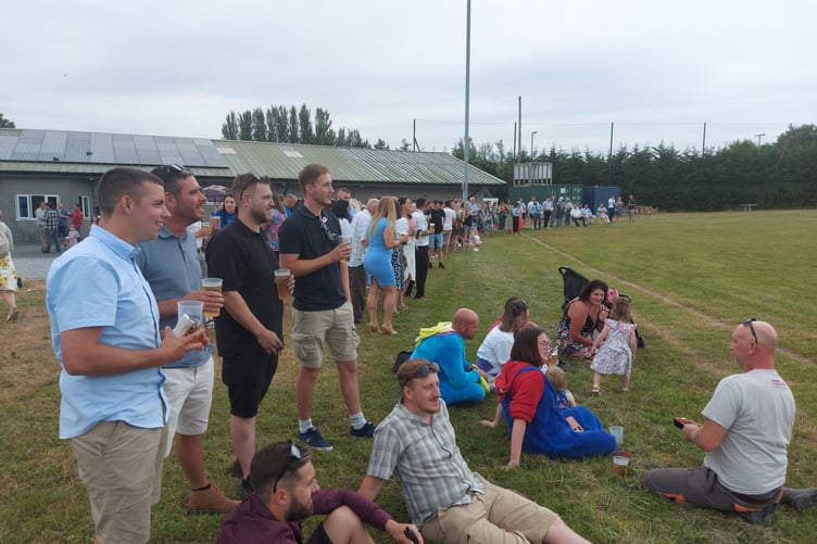 A large crowd of friends and family of Mike Allen celebrate his life