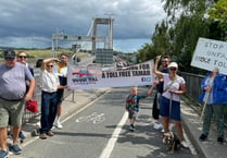 Hundreds march across the Tamar Bridge to protest against toll charges