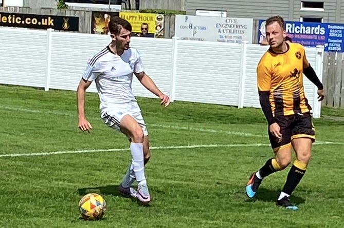 Torpoint's Elliott Crawford (right) in action on Saturday against Nailsea and Tickenham. Picture: Nigel Walrond