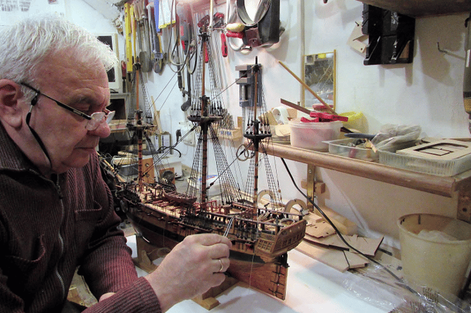 Vitaliy is building model ships fit for show in a museum from the middle of a war zone being constantly bombed. 