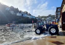 Looe RNLI volunteers launch into Storm Agnes to investigate a drifting paddleboard