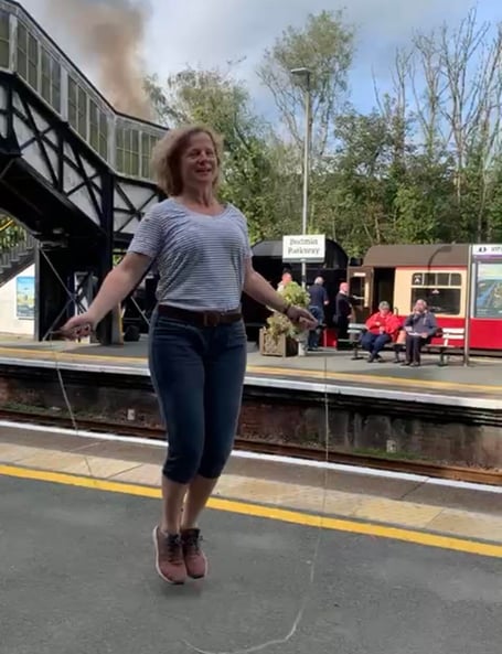Vicky skipping at Bodmin train station