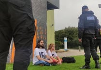 Just Stop Oil protestors cover Falmouth University in orange paint