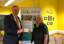 Liskeard mayor presents cheque to local foodbank