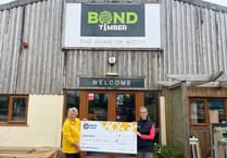 Swimming success for WH Bond boss raises £6,670 for Marie Curie
