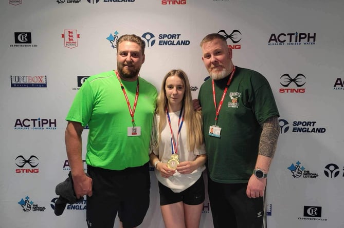 Breanna James with her coaches John Issac and Andy Timmons