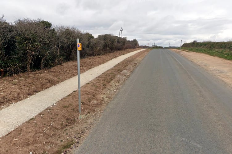 One of the 'no parking on verges at any time' signs at Tregantle