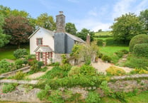 "Delightful" farmhouse for sale has countryside views and stables