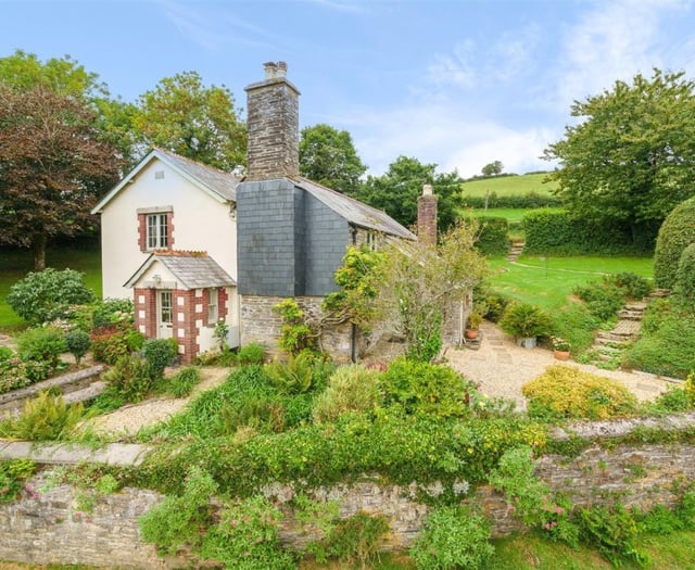 "Delightful" farmhouse for sale has countryside views and stables