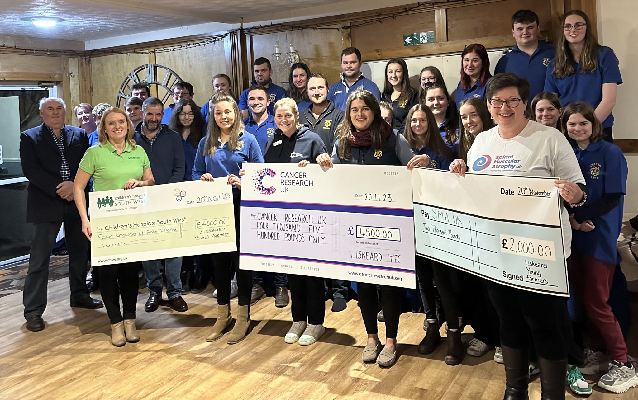 Liskeard Young farmers hand over £11,000 to chosen charities