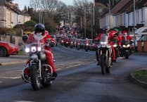 Watch as hundreds of Santas on motorbikes ride through Saltash 