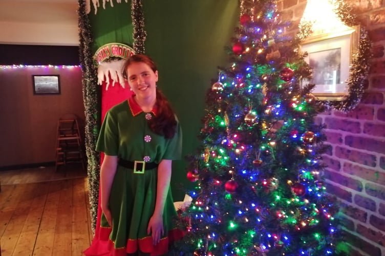 The cosy grotto saw 140 young people come and visit Santa and his helpers