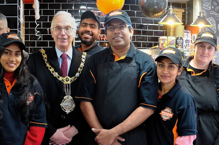 Staff members and the mayor of Looe at the grand opening 