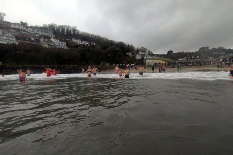 A group of brave local residents and visitors took a New Years Day dip in the chilly waters of Looe Ð kicking off the start of 2024.