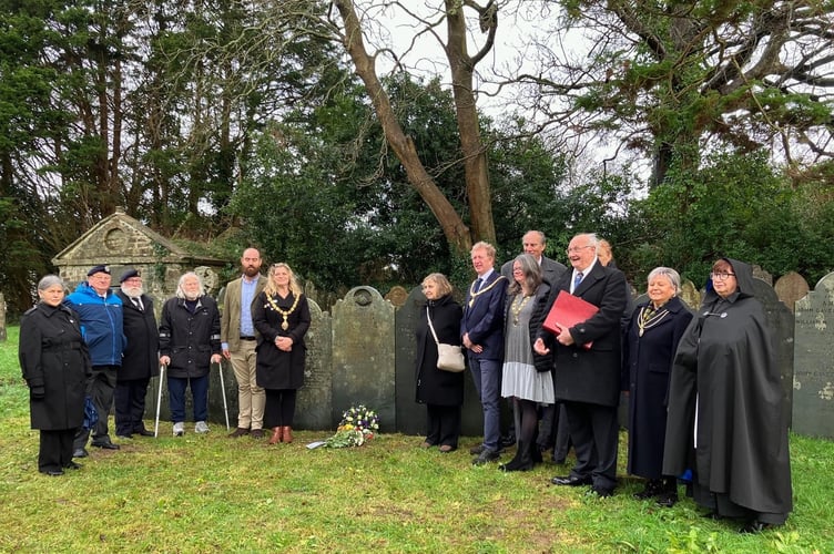 Local residents and visitors remembering William Odgers VC on the 150 aniversary of his death by his graveside