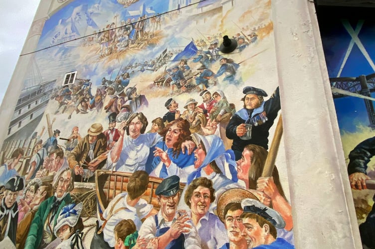 William Odgers is seen here painted into the right hand side of the mural on the side of the Union Inn, Saltash