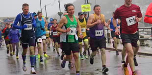 Watch brave runners battle heavy rain to take part in the Looe 10 