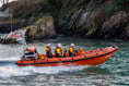 Two people cut off by tide rescued by Looe RNLI 